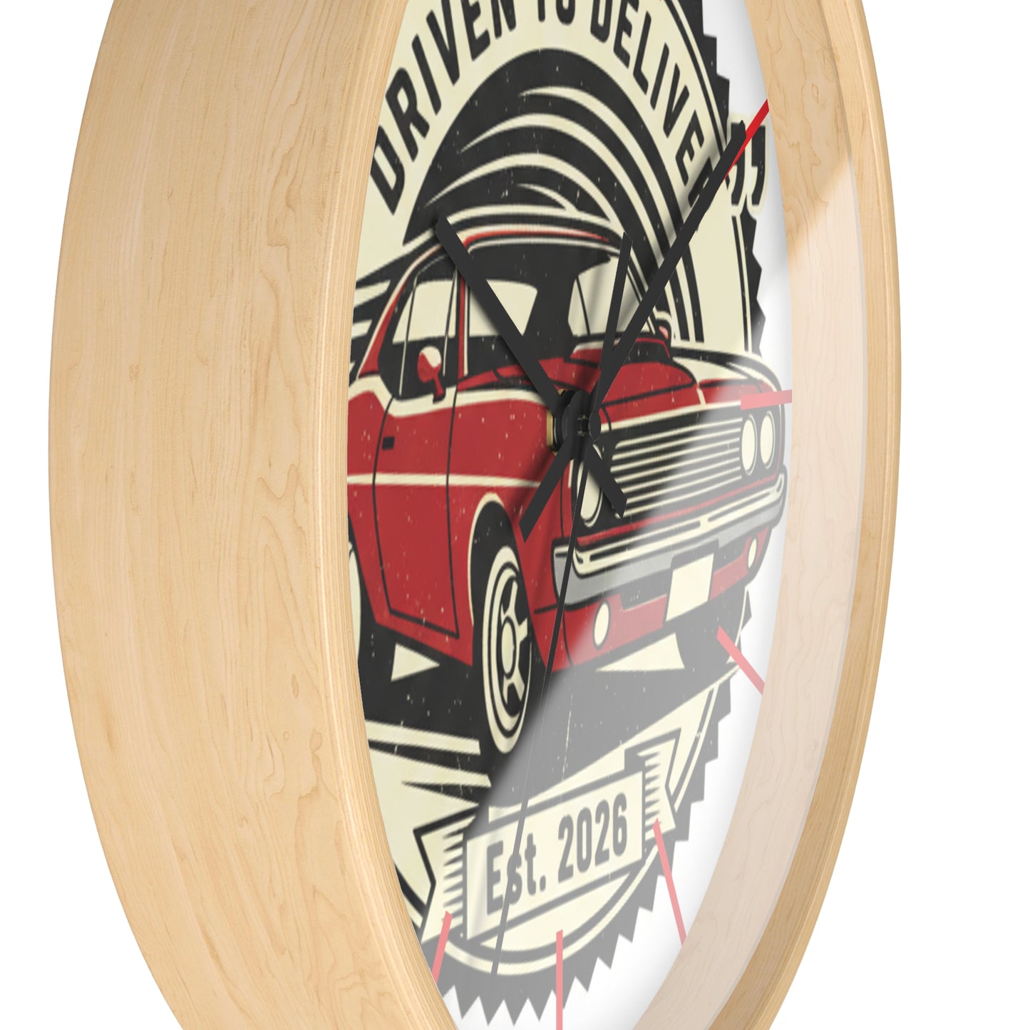 Wall clock with a red car design and 'Driven to Deliver' text on a white background